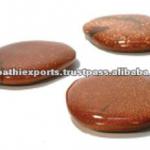 Goldstone pebbles