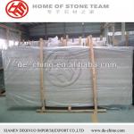 white wood grain marble slabs of window sills -